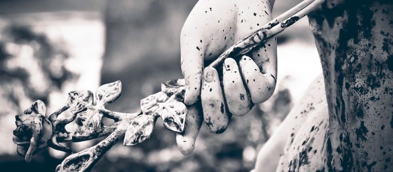 cemetery_statue_hand_with_rose